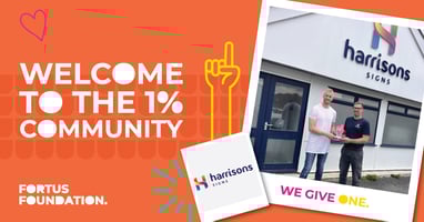 Harrisons Signs owner shaking hands with Head of Fortus Foundation to celebrate becoming a 1%er doner partner